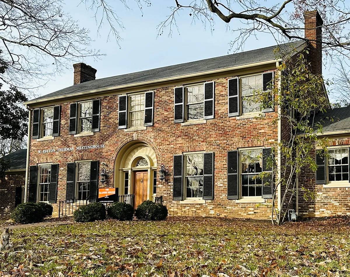 Exterior of Alumni House during the Fall.